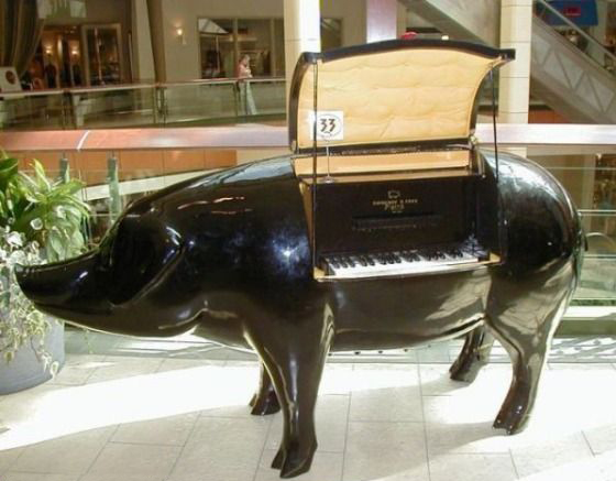 While we love all things cute and furry just as much as the next person, this special pig tops our list of animals that do it all. And, no piggy wasn't harmed when a genius built this piano.