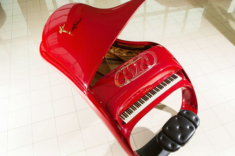 Can you imagine this Schimmel Pegasus Goquin masterpiece of futuristic heaven sitting in your living room? Since it is uber sleek and painted with Ferrari Rosso Red you shouldn't be surprised that is costs over $400,000 dollars.